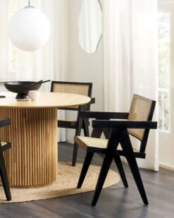 Sedia Da Pranzo Legno Rattan Naturale Nera WESTBROOK 12 Sedia Da Pranzo Legno Rattan Naturale Nera WESTBROOK -Beliani undef src sa picid 848243 type color image